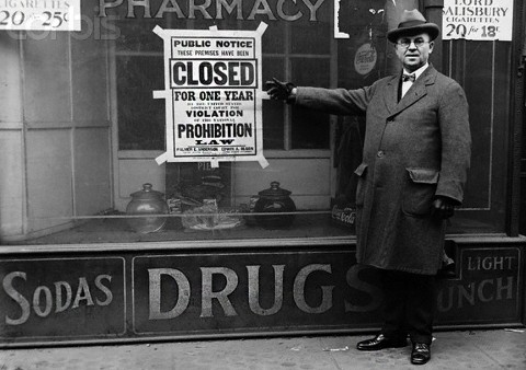 Man Points to Prohibition Sign